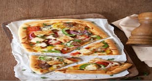 . Now, your perfect vegetarian pizza with mushroom and tofu is ready to serve. Seeing this, who would believe that this pizza would be a vegetarian pizza!